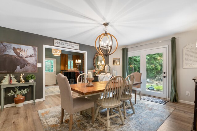 364 Hidden Oaks Trl, Cleveland, TN 37312 - dining area featuring a chandelier, plenty of natural light, and wood finished floors