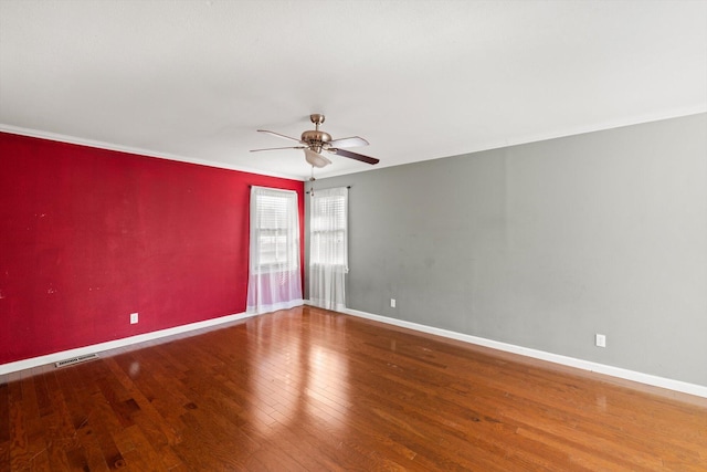 unfurnished room with hardwood / wood-style floors and ceiling fan