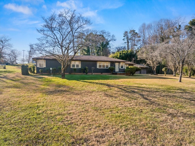 exterior space with a front lawn