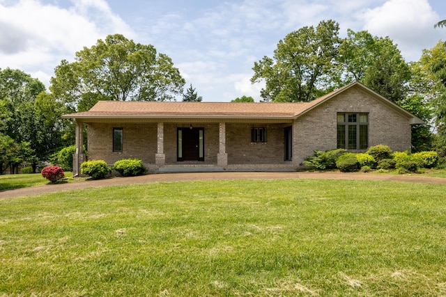 139 County Road 147, Riceville, TN 37370 - single story home with covered porch, a front lawn, and brick siding