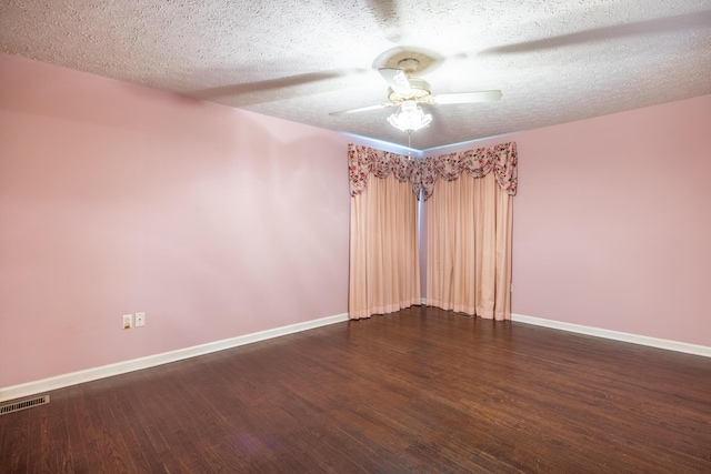 139 County Road 147, Riceville, TN 37370 - spare room featuring baseboards, ceiling fan, wood finished floors, and visible vents