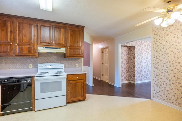 139 County Road 147, Riceville, TN 37370 - kitchen featuring white electric range oven, ceiling fan, black dishwasher, light countertops, and under cabinet range hood