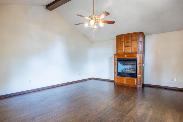 139 County Road 147, Riceville, TN 37370 - unfurnished living room with ceiling fan, baseboards, lofted ceiling with beams, dark wood-style floors, and a glass covered fireplace