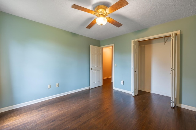 139 County Road 147, Riceville, TN 37370 - unfurnished bedroom with a ceiling fan, baseboards, and wood finished floors