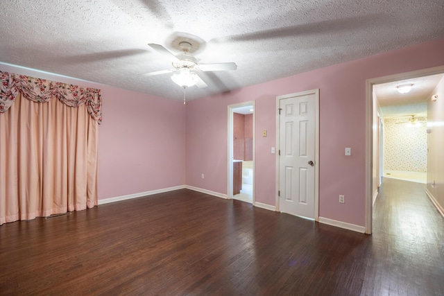 139 County Road 147, Riceville, TN 37370 - unfurnished bedroom with a textured ceiling, baseboards, a ceiling fan, and wood finished floors