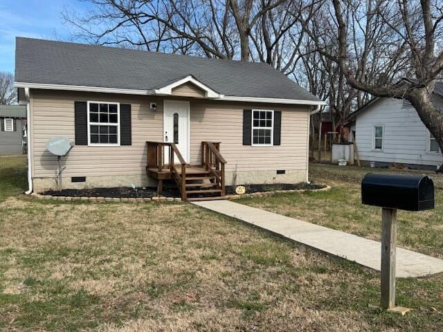 view of front of property featuring a front yard