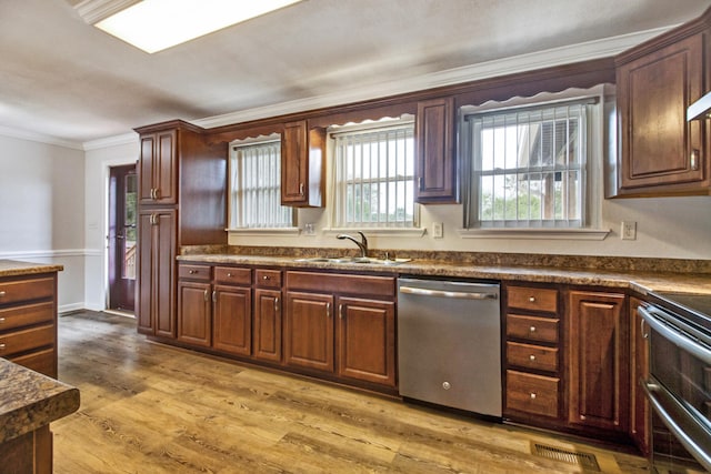 kitchen featuring sink, stainless steel dishwasher, stove, light hardwood / wood-style floors, and ornamental molding