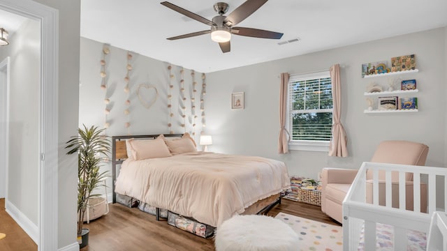 1813 White Oak Valley Rd, Cleveland, TN 37312 - bedroom featuring wood finished floors and a ceiling fan