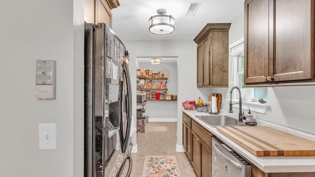 1813 White Oak Valley Rd, Cleveland, TN 37312 - kitchen featuring freestanding refrigerator, dishwasher, and light countertops