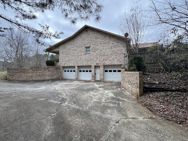 view of home's exterior with a garage