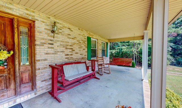 view of patio featuring a porch