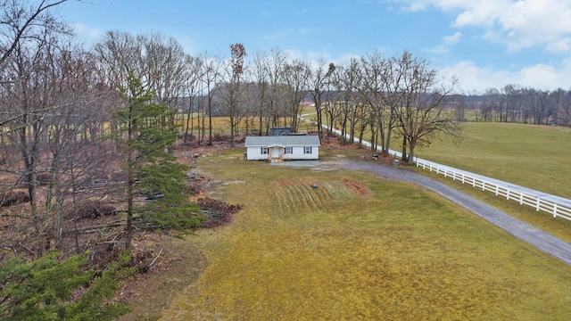 birds eye view of property featuring a rural view