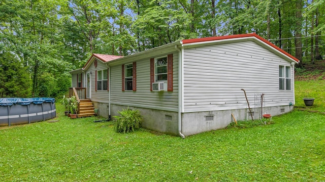 1426 Nebo Rd, Ten Mile, TN 37880 - view of property exterior featuring crawl space, a covered pool, and a lawn