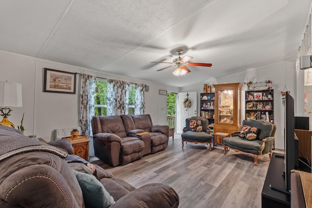 1426 Nebo Rd, Ten Mile, TN 37880 - living area featuring ceiling fan, light wood-type flooring, and a textured ceiling