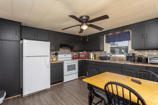 kitchen featuring backsplash, white appliances, ceiling fan, dark wood-type flooring, and sink