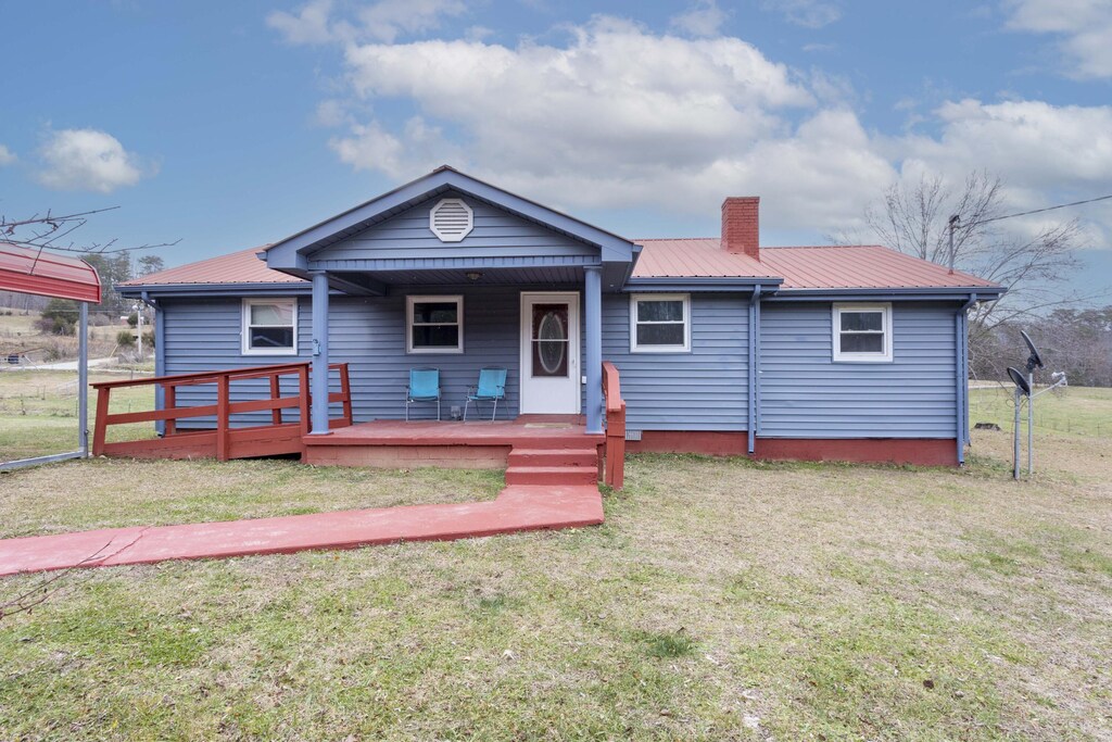 16627 Old State Highway 28, Pikeville, TN 37367 - bungalow-style home with covered porch and a front yard