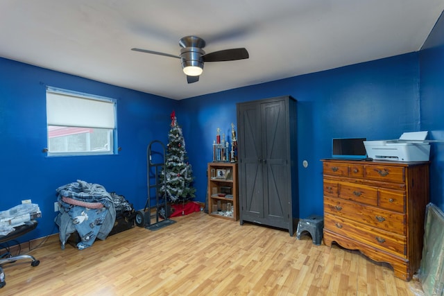 misc room featuring ceiling fan and light hardwood / wood-style flooring