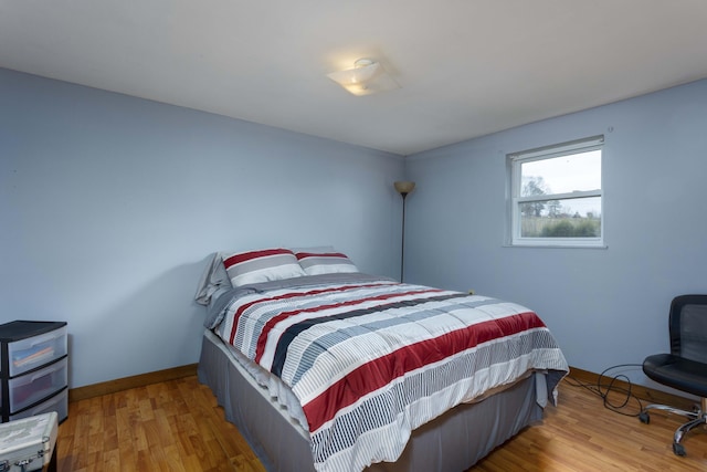 bedroom featuring hardwood / wood-style floors