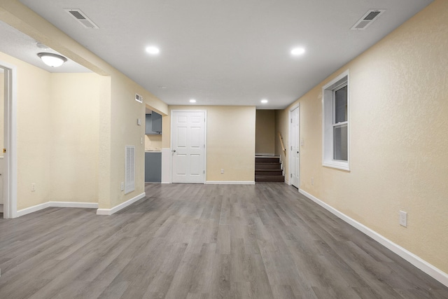 unfurnished living room with light wood-type flooring