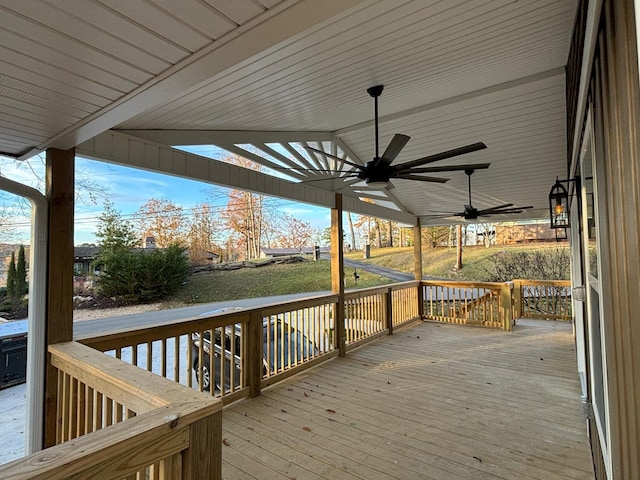 wooden deck with ceiling fan