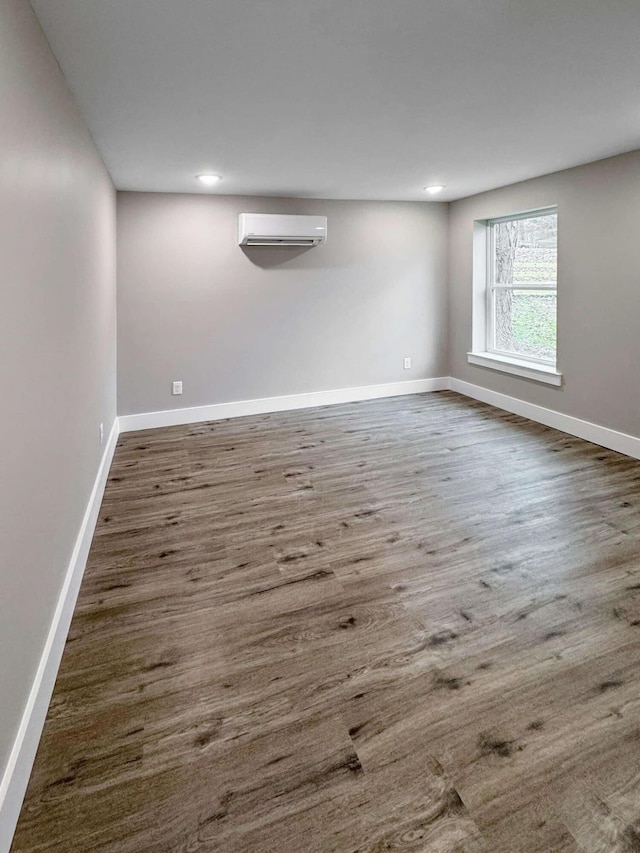 spare room featuring a wall unit AC