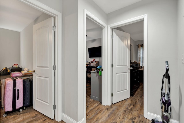 1042 Mccann Dr SE, Cleveland, TN 37311 - hallway with baseboards and wood finished floors