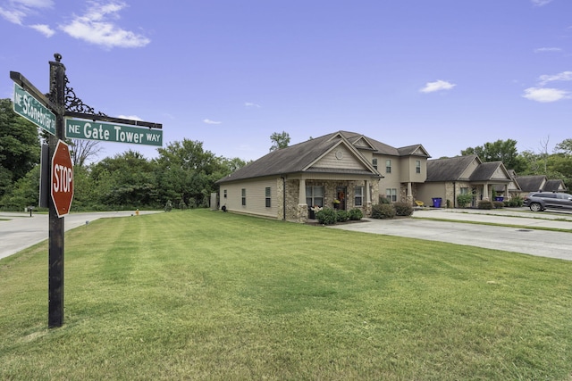 view of front of home with a front lawn