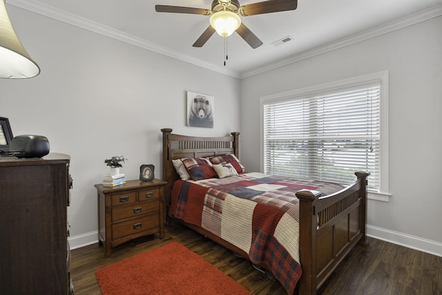 bedroom featuring multiple windows, ornamental molding, ceiling fan, and dark wood-type flooring