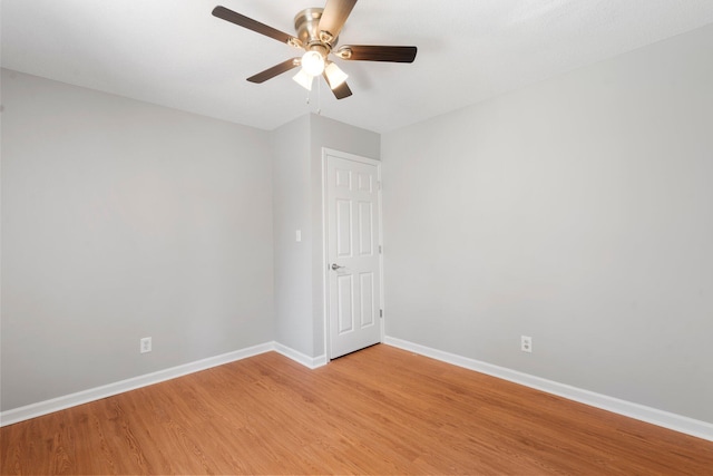 7701 Diamondhead Dr, Ooltewah, TN 37363 - spare room with light wood finished floors and ceiling fan
