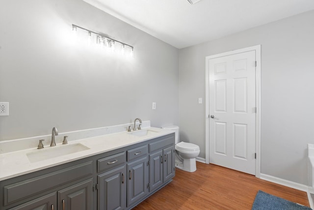 7701 Diamondhead Dr, Ooltewah, TN 37363 - bathroom featuring wood finished floors and double vanity