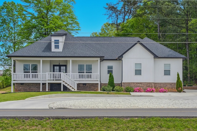 1786 Welcome Valley Rd, Benton, TN 37307 - view of front of home with stairway, a porch, and a shingled roof