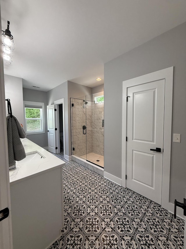 1786 Welcome Valley Rd, Benton, TN 37307 - full bathroom with toilet, vanity, a stall shower, and baseboards