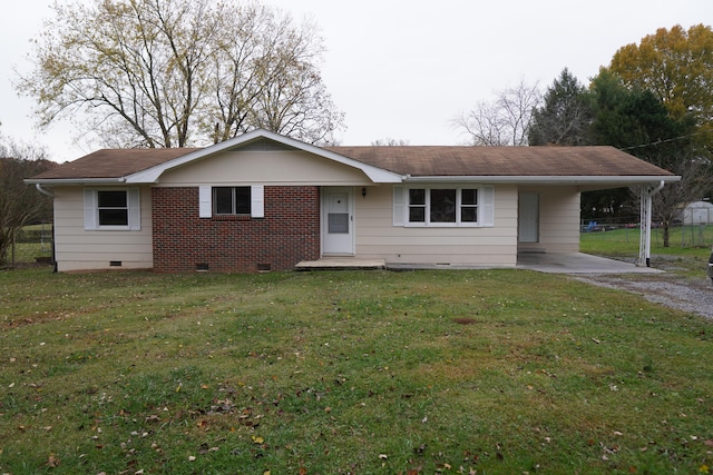 single story home with a front lawn and a carport