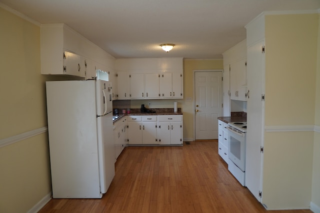 kitchen with white cabinets, light hardwood / wood-style floors, and white appliances