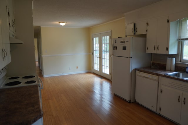 kitchen featuring french doors, light wood-type flooring, white appliances, crown molding, and white cabinetry