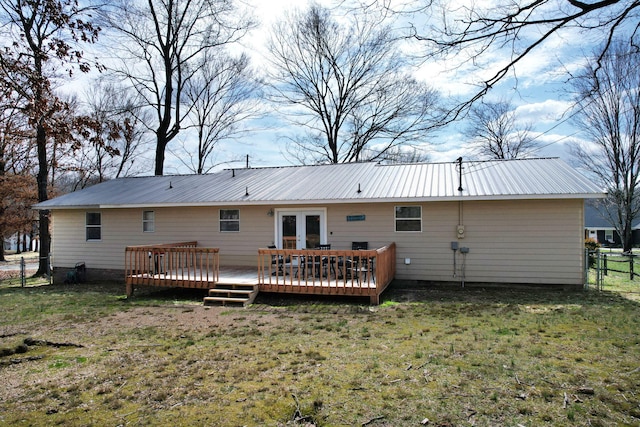 back of house with a yard, french doors, fence, and a wooden deck