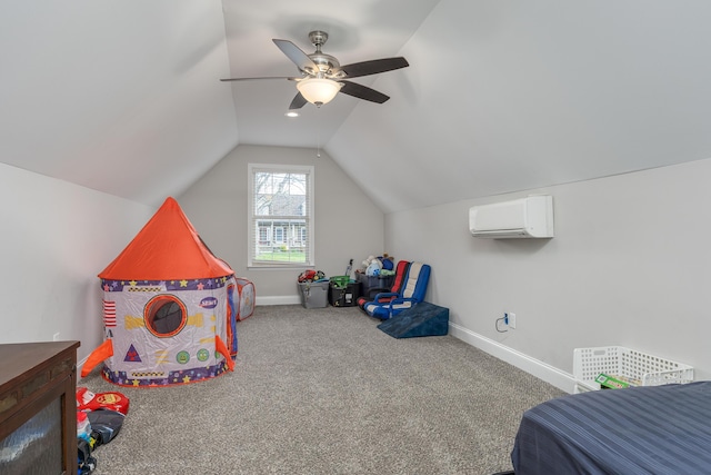 rec room with a wall mounted AC, ceiling fan, carpet, and vaulted ceiling