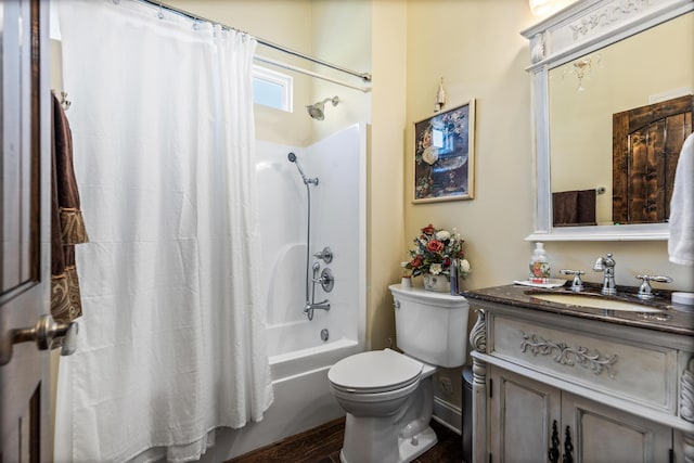 full bathroom with shower / tub combo, vanity, and toilet