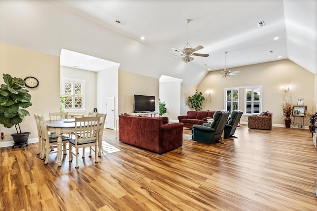 living area featuring baseboards, recessed lighting, visible vents, and light wood-style floors