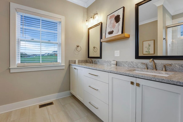 bathroom featuring vanity, walk in shower, and ornamental molding