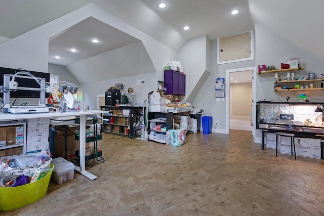 interior space with light parquet flooring and vaulted ceiling