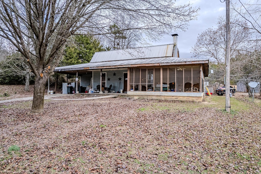 exterior space with a sunroom