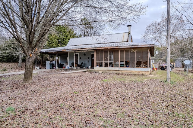 exterior space with a sunroom