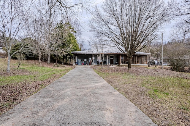 view of front facade featuring a carport