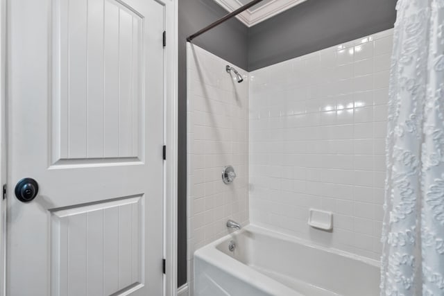 bathroom featuring shower / bathtub combination with curtain