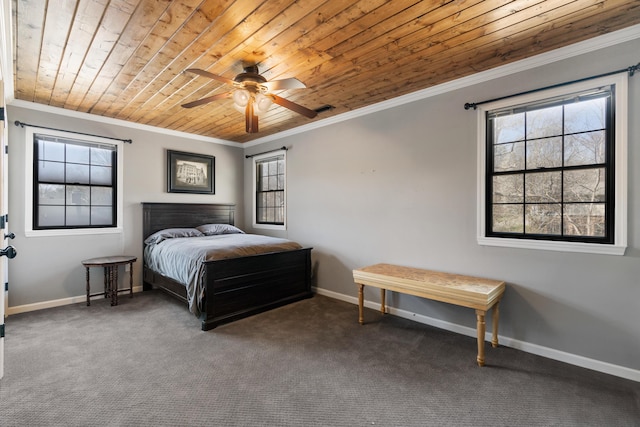 bedroom with visible vents, crown molding, baseboards, carpet floors, and wooden ceiling