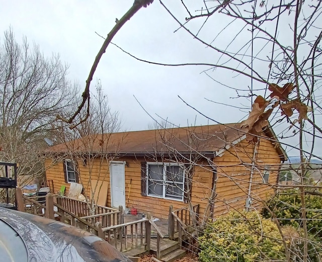 view of front of house featuring a deck