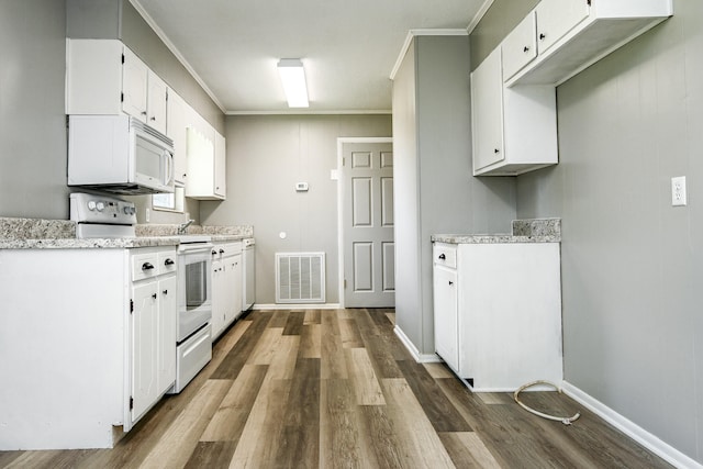 kitchen featuring dark hardwood / wood-style flooring, white appliances, white cabinetry, and crown molding