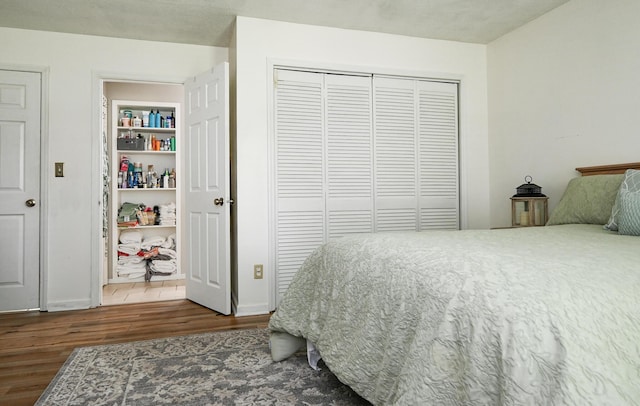 4901 Cindy Cir NW, Cleveland, TN 37312 - bedroom featuring wood finished floors and a closet