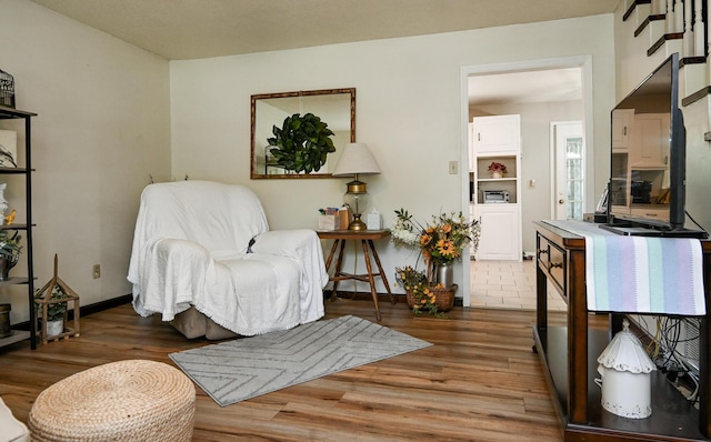 4901 Cindy Cir NW, Cleveland, TN 37312 - sitting room with wood finished floors and baseboards